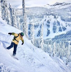 A person snowboarding down a mountain